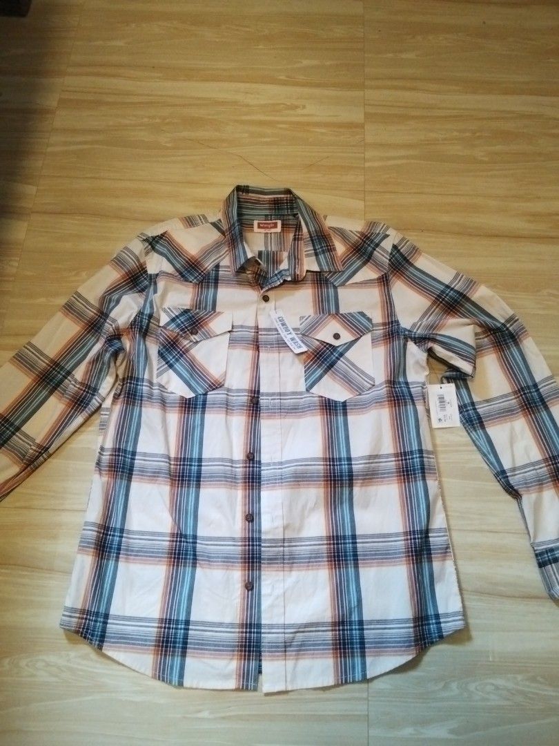 Wrangler Men's long sleeve polo (Category: Tshirts & Polo Shirts ) located in Calasiao. Submitted by alluringvenus.thriftshop (Listing ID 1464159257, Image 2). Description: Wrangler Men's long sleeve polo brand new with tags.