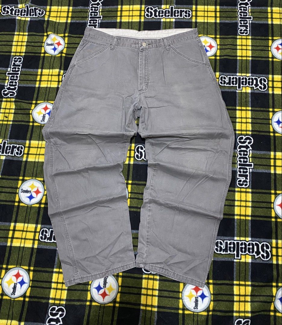WRANGLER,Carpenter workwear pants (Category: Jeans) located in Cavite. Submitted by jc_thrift95 (Listing ID 1464213801, Image 1). Description: - a pair of Wrangler relaxed-fit gray canvas carpenter workwear pants featuring classic utility pockets and a wide-leg silhouette. - Made in Mexico - Color rate 8/10 - See pictures details for dimes. - L- 39 inch - W- 17 inch.