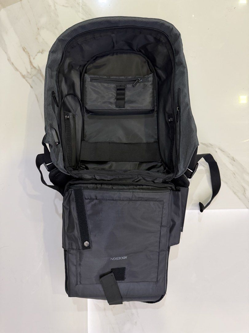 XDDESIGN Anti-Theft Backpack Camouflage (Category: Backpacks) located in Makati City. Submitted by monkeykingo (Listing ID 1464141951, Image 3). Description: - XDDESIGN Camouflage Anti-Theft Backpack - Built-in USB charging port - Multiple internal compartments for organization - Padded shoulder straps and back panel for enhanced comfort - Ideal for daily commutes and travel.