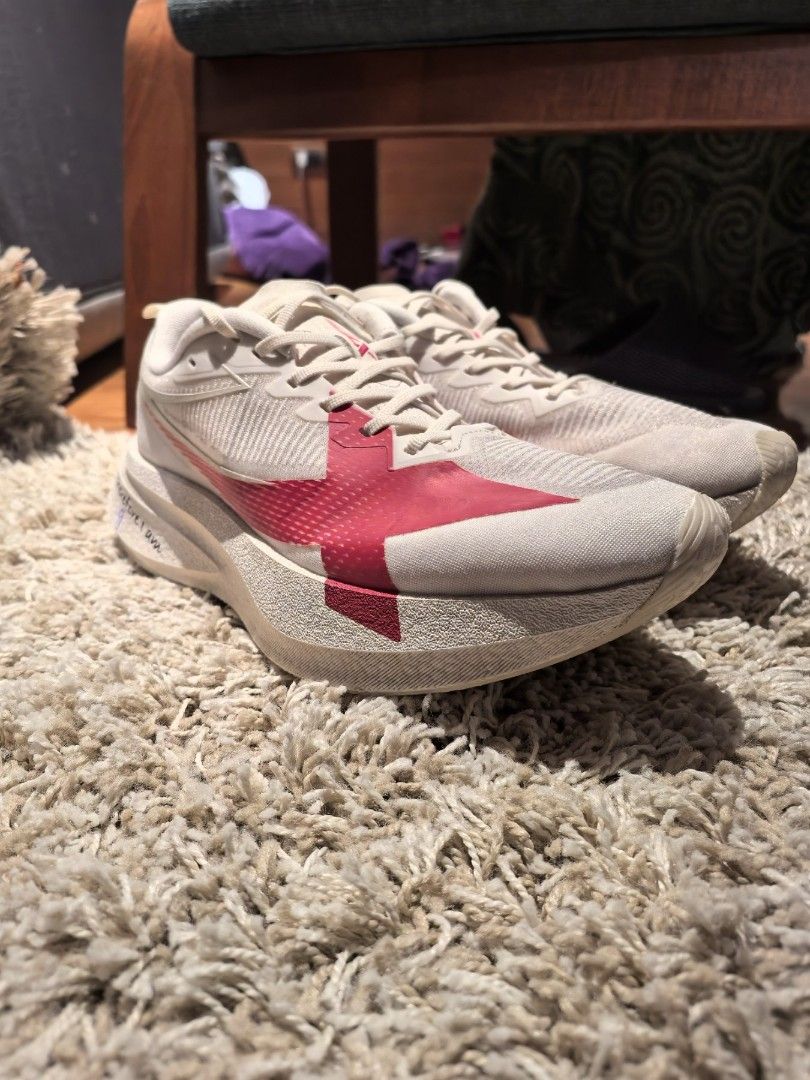 XTEP 2000km 5.0 Pro (Category: Sneakers) located in Paranaque City. Submitted by mpx2023 (Listing ID 1464241210, Image 1). Description: -Off White XTEP running shoes with stylish red accent -Only used a few times on treadmill for testing. - Authentic- Features the inspiring quote "I run, therefore I am." on the side. - Lightweight and breathable mesh upper for maximum comfort. - Designed for optimal performance during runs. - Versatile for both a