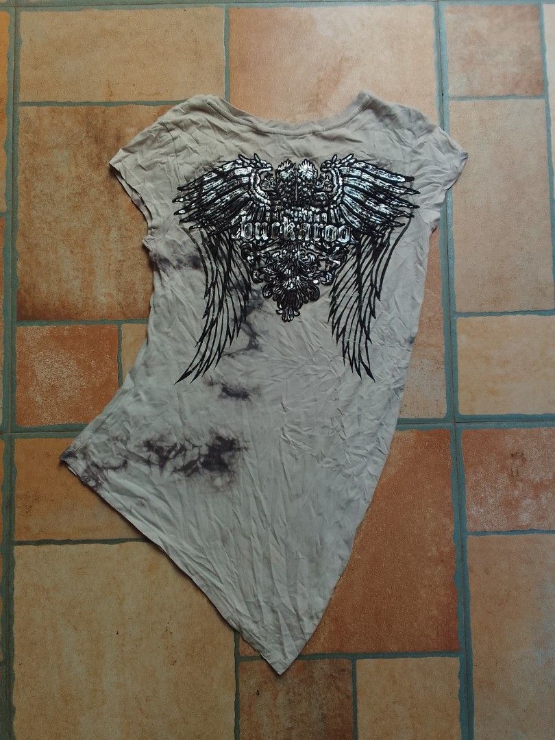 Y2K GRUNGE SKULL & WINGS BUCKAROO TOP (Category: Shirts) located in Manila. Submitted by _wtfroza (Listing ID 1464247634, Image 1). Description: 📌size: size XS on tag (fits xs to s) -no issues -in good condition -need thorough wash.