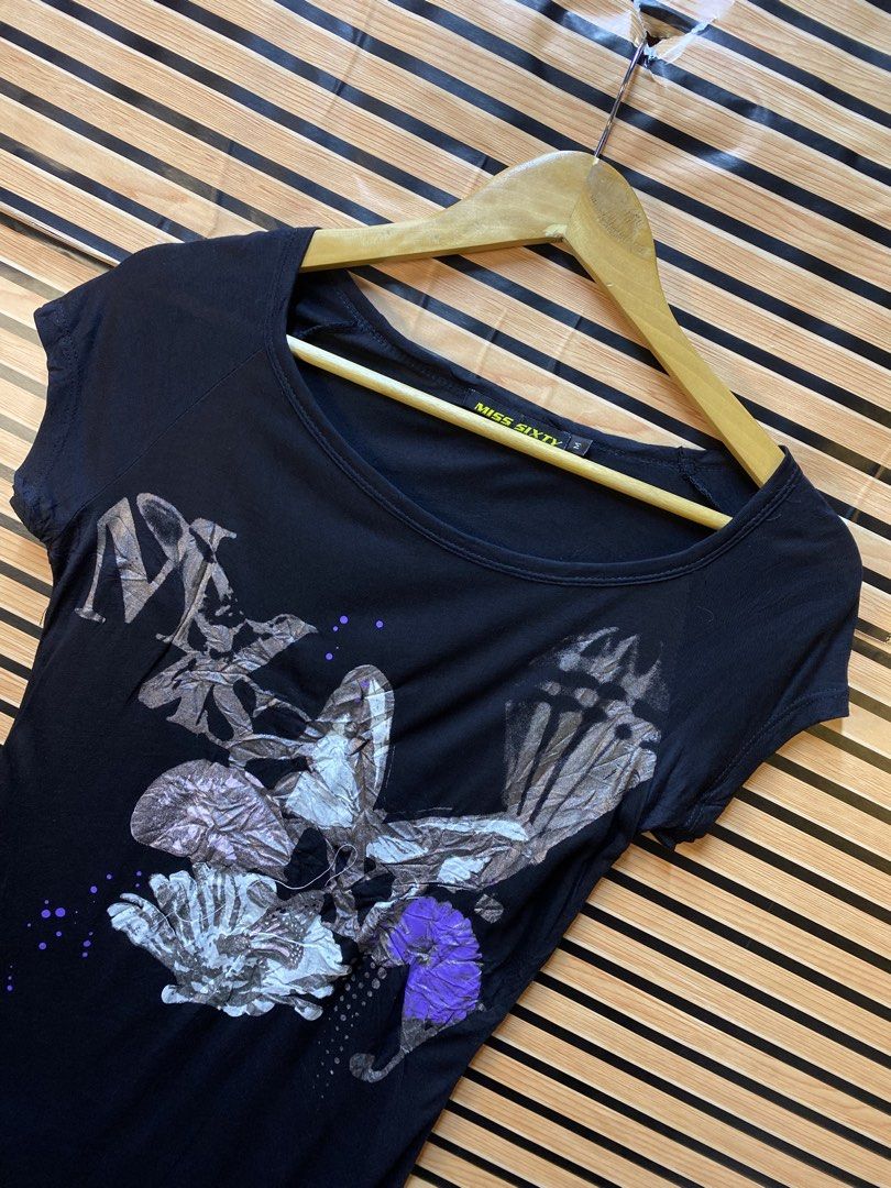 Y2k Miss Sixty (Category: Shirts) located in Makati City. Submitted by drip.poww (Listing ID 1464192997, Image 2). Description: - Authentic Miss Sixty - Color: Black - Size: Small - Dimes: 17x26 - Authentic - Excellent condition - Need wash, fresh from bale - Material: 100% Cotton Please don’t expect too much—these are thrifted (ukay) items. 😊 !!STILL NEGOTIABLE!!.