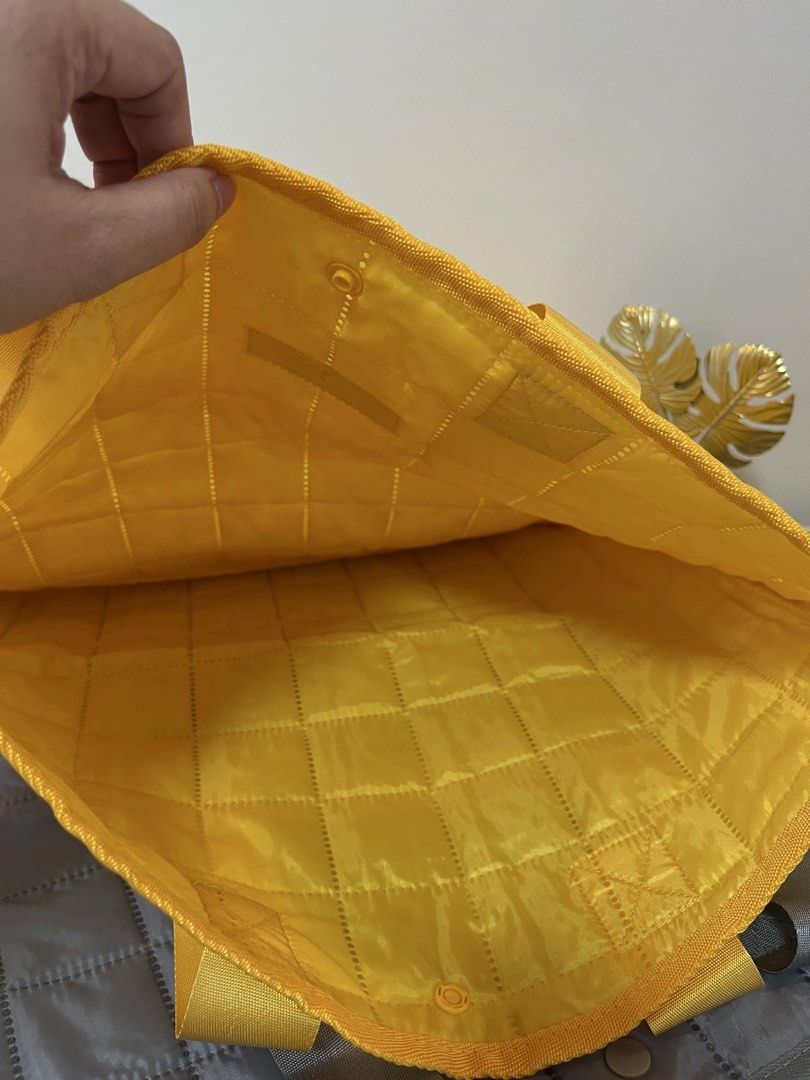 Yellow Quilted BDO Network Bank Tote Bag (Category: Tote Bags) located in Paranaque City. Submitted by sissyloveph (Listing ID 1464287116, Image 3). Description: 5pcs avail - Bright yellow quilted tote bag - Snap button closure at the top - Quilted interior - Ideal for everyday essentials, shopping, or daily use - Simple and functional design.