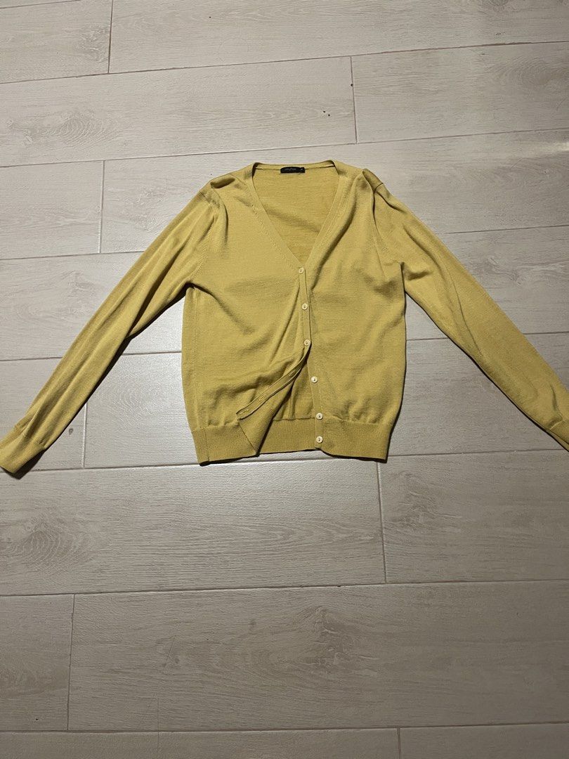 Yellow V-Neck Button-Up Cardigan (Category: Coats, Jackets and Outerwear) located in Makati City. Submitted by sixelaa (Listing ID 1464226554, Image 1). Description: - Lightweight yellow cardigan - V-neckline with button closure - Long sleeves - Ribbed hem and cuffs - Ideal for everyday layering.