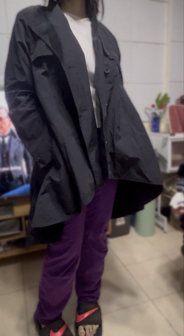 “YOU” Clothing Black Button-Up Trench Coat Style Jacket (Category: Coats, Jackets and Outerwear) located in Surigao. Submitted by boonz71_1971 (Listing ID 1464175155, Image 2). Description: - Width 17” Length 32” - Condition: 9/10 - Black jacket with a trench coat vibe - Button-up front - Relaxed fit - Side pockets - Ideal for layering - Versatile for various outfits.