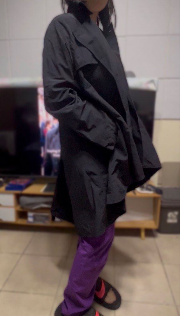“YOU” Clothing Black Button-Up Trench Coat Style Jacket (Category: Coats, Jackets and Outerwear) located in Surigao. Submitted by boonz71_1971 (Listing ID 1464175155, Image 3). Description: - Width 17” Length 32” - Condition: 9/10 - Black jacket with a trench coat vibe - Button-up front - Relaxed fit - Side pockets - Ideal for layering - Versatile for various outfits.