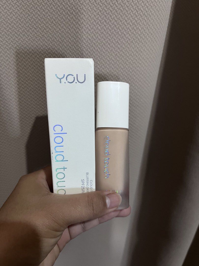 Y.O.U Cloud Touch Blurring Skin Tint SPF25PA+++ (Category: Makeup) located in Tuguegarao City. Submitted by vinsyyy (Listing ID 1464169330, Image 1). Description: The Y.O.U Cloud Touch Blurring Skin Tint is a 20ml skincare-infused liquid base product designed for oily and acne-prone skin. Key FeaturesCoverage: Medium to full coverage with a soft-focus, natural finish that blurs pores. Sun Protection: Includes SPF 25 PA+++. Wear Time: Formulated f