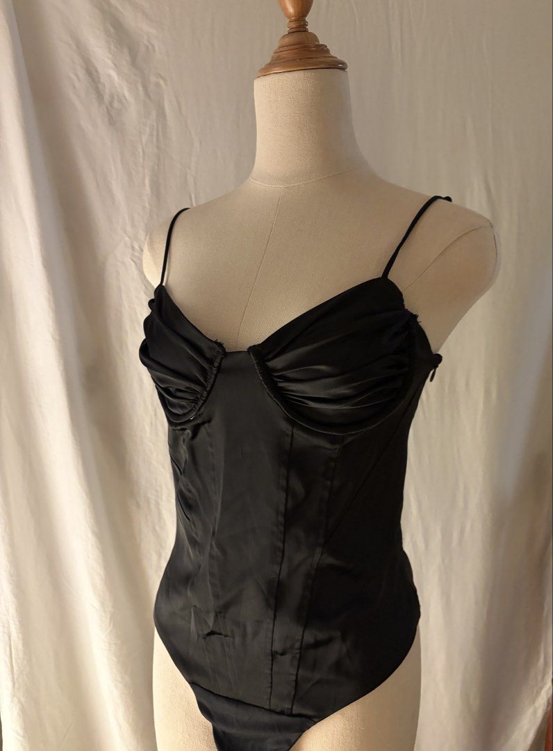 Zara Black Satin Bustier Corset Bodysuit (Category: Sleeveless) located in Makati City. Submitted by chiclane_ (Listing ID 1464242518, Image 2). Description: - invisible zipper closure at the side - snap button closure - adjustable spaghetti straps .