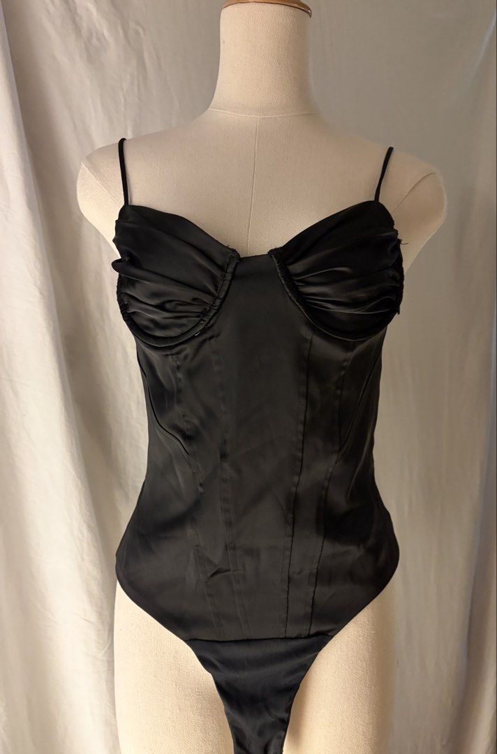 Zara Black Satin Bustier Corset Bodysuit (Category: Sleeveless) located in Makati City. Submitted by chiclane_ (Listing ID 1464242518, Image 1). Description: - invisible zipper closure at the side - snap button closure - adjustable spaghetti straps .