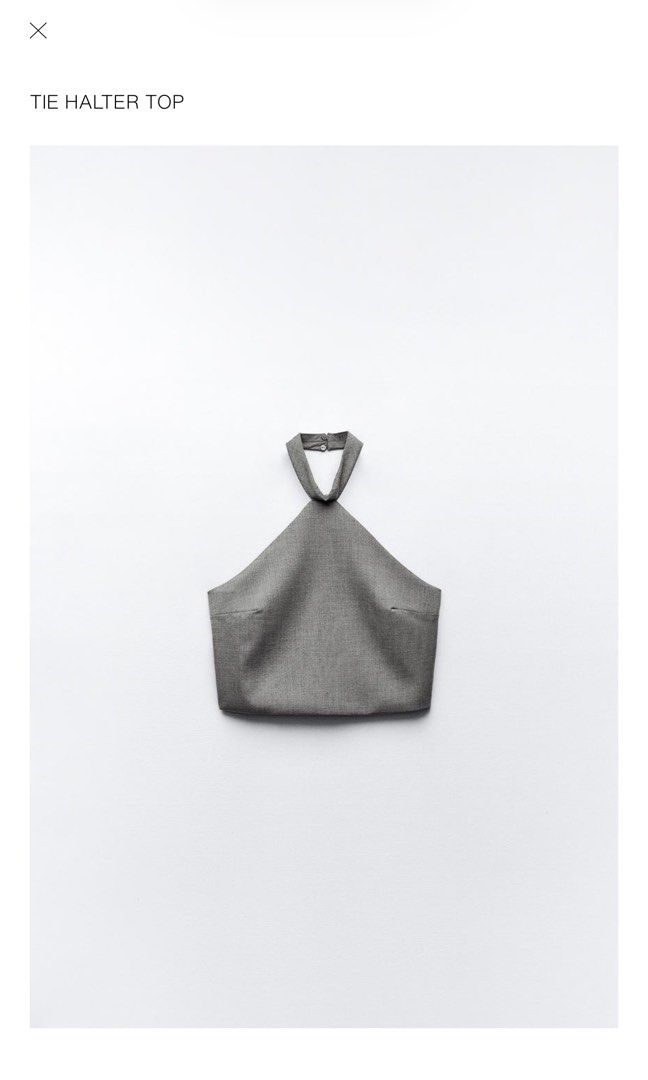 Zara Grey Tie Halter Top Size S (Category: Sleeveless) located in Binangonan. Submitted by curatedbyjuys (Listing ID 1464192911, Image 1). Description: - Zara grey halter top - Features a tie neck detail - Side zip closure for easy wear - Made from a structured material - Brand new, never worn (cut tag only) - Perfect for dressing up or down.
