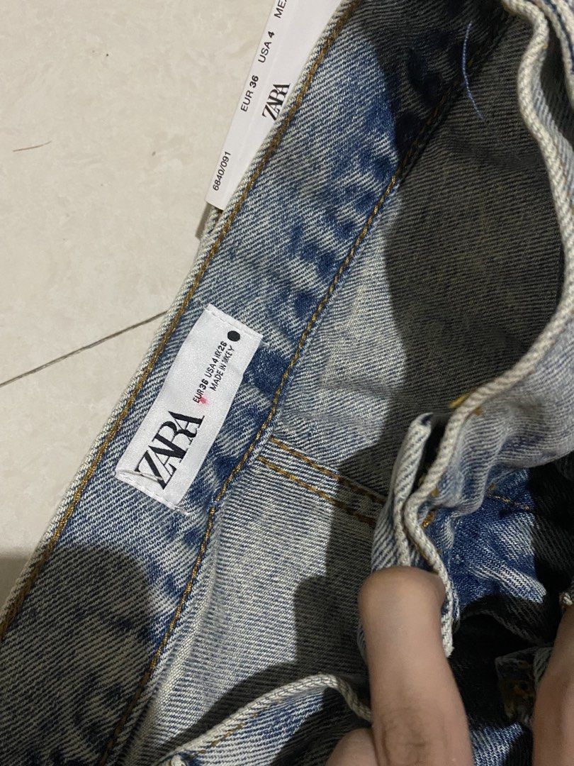 Zara Layered Denim Pants Distressed Blue Jeans (Category: Jeans) located in Taguig. Submitted by _lly.wyn (Listing ID 1464200155, Image 3). Description: - Zara layered denim pants - Distressed blue wash - Unique skirt-like overlay - Straight leg fit - Made in Turkey - Size: EUR 36, US 4, MEX 28 (check tag for exact sizing) - Statement piece.