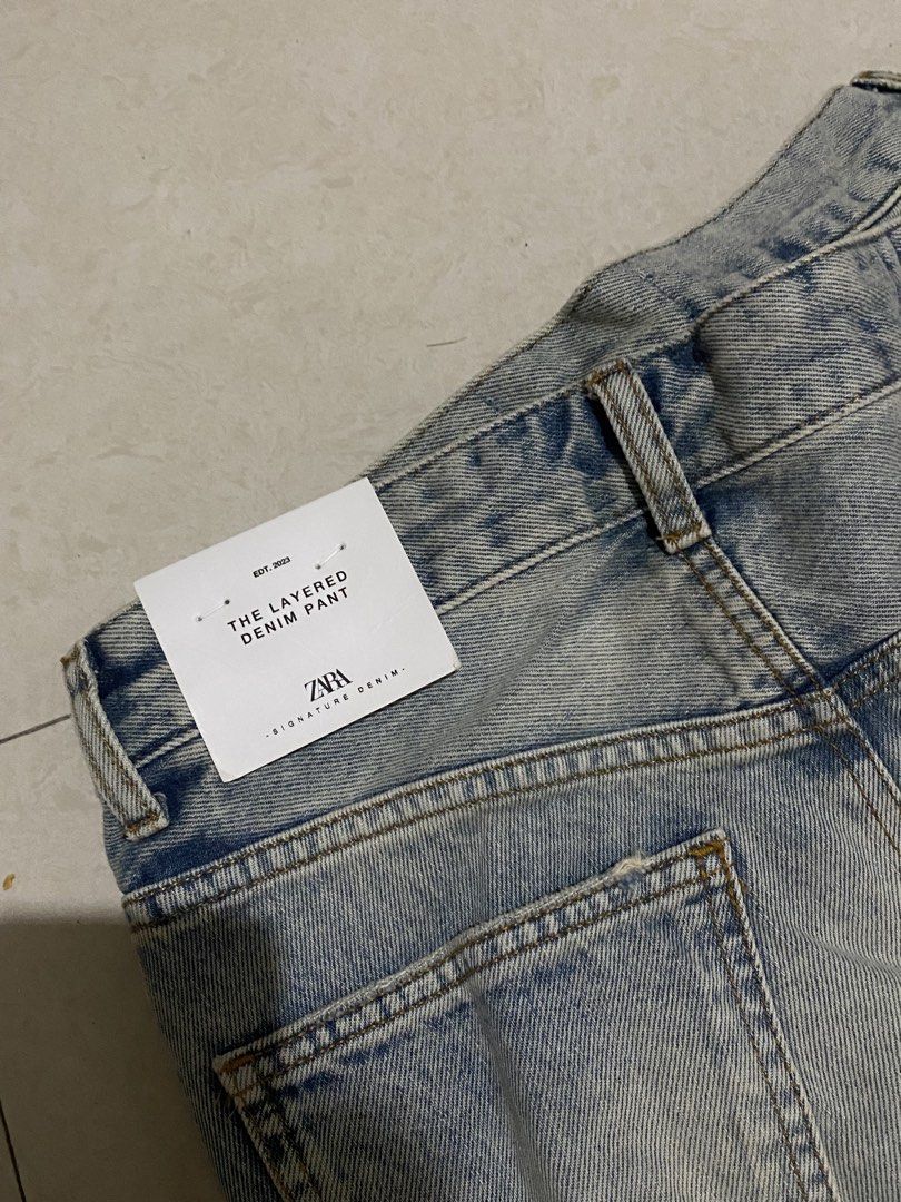 Zara Layered Denim Pants Distressed Blue Jeans (Category: Jeans) located in Taguig. Submitted by _lly.wyn (Listing ID 1464200155, Image 2). Description: - Zara layered denim pants - Distressed blue wash - Unique skirt-like overlay - Straight leg fit - Made in Turkey - Size: EUR 36, US 4, MEX 28 (check tag for exact sizing) - Statement piece.