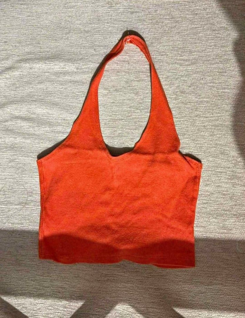 Zara Orange Ribbed Halter Neck Crop Top (Category: Sleeveless) located in Manila. Submitted by jaysieseva620 (Listing ID 1464265375, Image 1). Description: - Zara orange ribbed halter neck crop top - Made in Bangladesh - Size: EUR 26, USA 26, MEX 26 - Versatile for casual or dressed-up occasions.