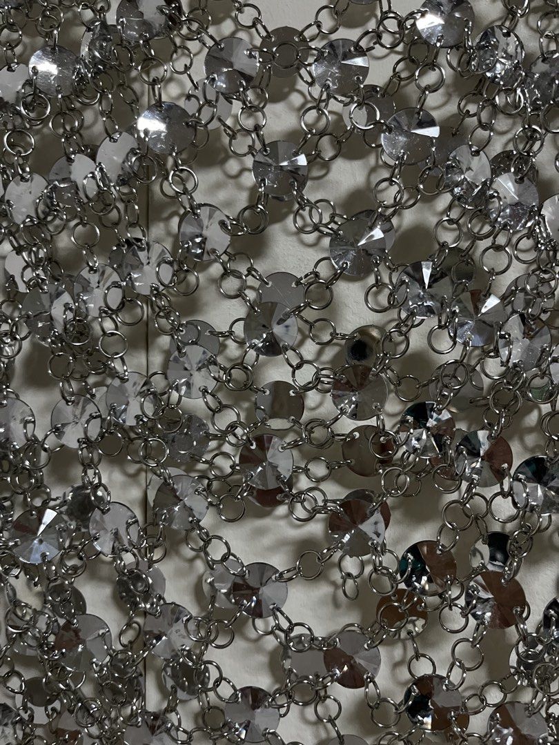 Zara Silver Chainmail Top (Category: Sleeveless) located in Manila. Submitted by lorenasant37621 (Listing ID 1464215768, Image 3). Description: - Sparkly silver chainmail top from Zara - Features many small circular metals linked together - Ideal for parties or festivals - Adds significant shine to any outfit - Unique and eye-catching piece.