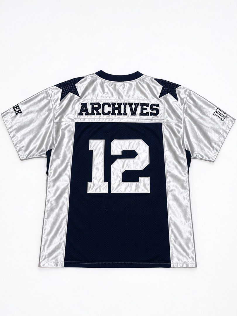 2000 Football T-Shirts Navy (Category: Tshirts & Polo Shirts ) located in Palo. Submitted by kat.bins (Listing ID 1464456728, Image 2). Description: Dimes Width - 23 Length - 29.