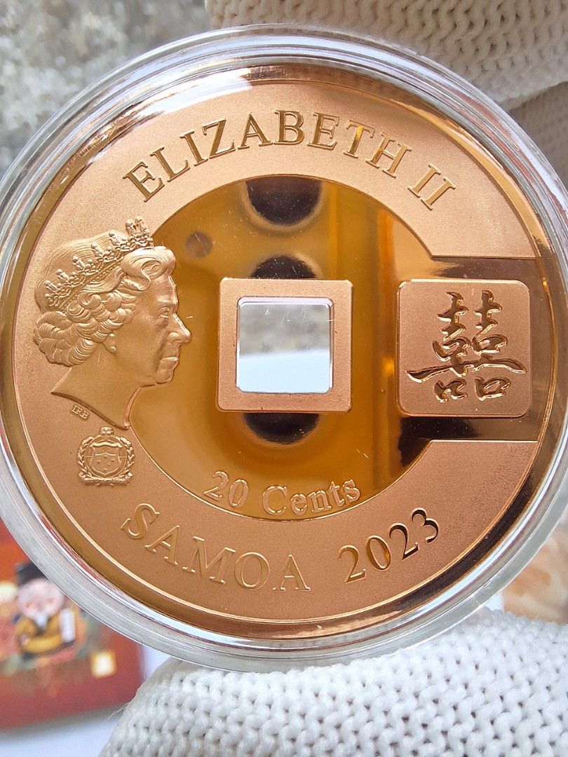 2023 Samoa Longevity 20 Cents Proof Copper Coin (Category: Currency) located in Makati City. Submitted by jed.tan (Listing ID 1464414354, Image 3). Description: - 25g pure Copper - Proof Condition with Hollow out and Hologram - Queen Elizabeth II portrait Mintage - 9,999 pcs. Payment - Gcash, BPI Meetup - Rockwell Powerplant Mall - Security Bank (Jupiter st. corner Paseo de Roxas).