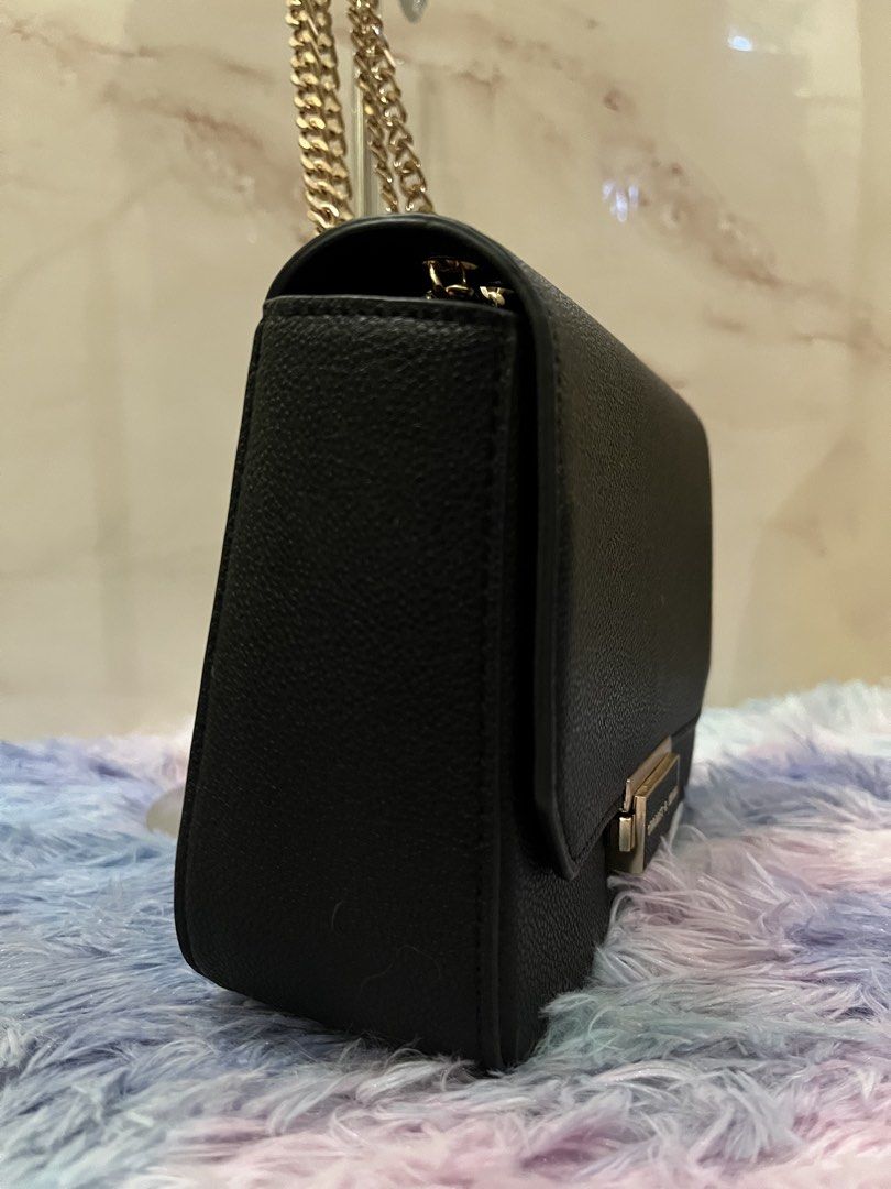2 Way Charles and Keith Bag (Category: Shoulder Bags) located in Buenavista. Submitted by lalaprelovedbags (Listing ID 1464366154, Image 2). Description: .