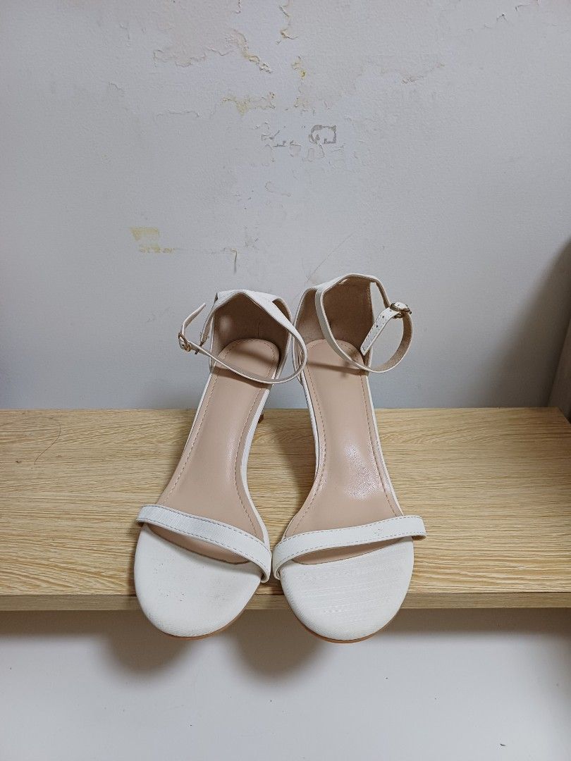 2nd Hand White Ankle Strap 2.5 Inch Heels Size 38 (Category: Heels) located in Manila. Submitted by kate92653 (Listing ID 1464552158, Image 2). Description: 2ND HAND WHITE ANKLE STRAP 2.5 INCH HEELS Size 38 - Used once or twice - Chic white heels with a nude sole - Adjustable ankle strap with buckle closure - Size 38 - 2.5 inch heel MOP: GCash, Maribank, Cash (only for meet-up) MOD: Meet-up, SDD Couriers, JnT, LBC, (SF will be shouldered by the b