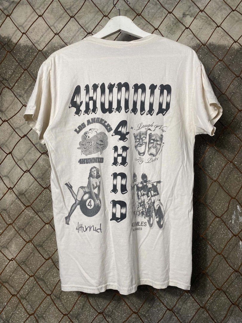 4Hunnid Graphic T-Shirt Medium (Category: Tshirts & Polo Shirts ) located in Mendez-Nunez. Submitted by leighthrift (Listing ID 1464529271, Image 1). Description: 4HUNNED TEE Size medium Width 21.5 Length 28.5 - Brand: 4Hunnid - Color: White - Size: Medium - Design: Large graphic print on back (logo, masks, pin-up girl, motorcycle) - Front: Plain white - Style: Streetwear .
