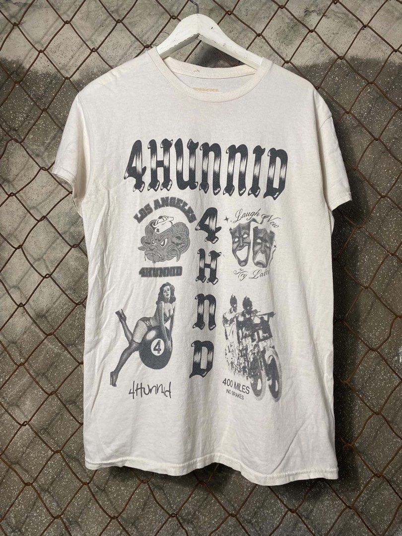 4Hunnid Graphic T-Shirt Medium (Category: Tshirts & Polo Shirts ) located in Mendez-Nunez. Submitted by leighthrift (Listing ID 1464529271, Image 2). Description: 4HUNNED TEE Size medium Width 21.5 Length 28.5 - Brand: 4Hunnid - Color: White - Size: Medium - Design: Large graphic print on back (logo, masks, pin-up girl, motorcycle) - Front: Plain white - Style: Streetwear .