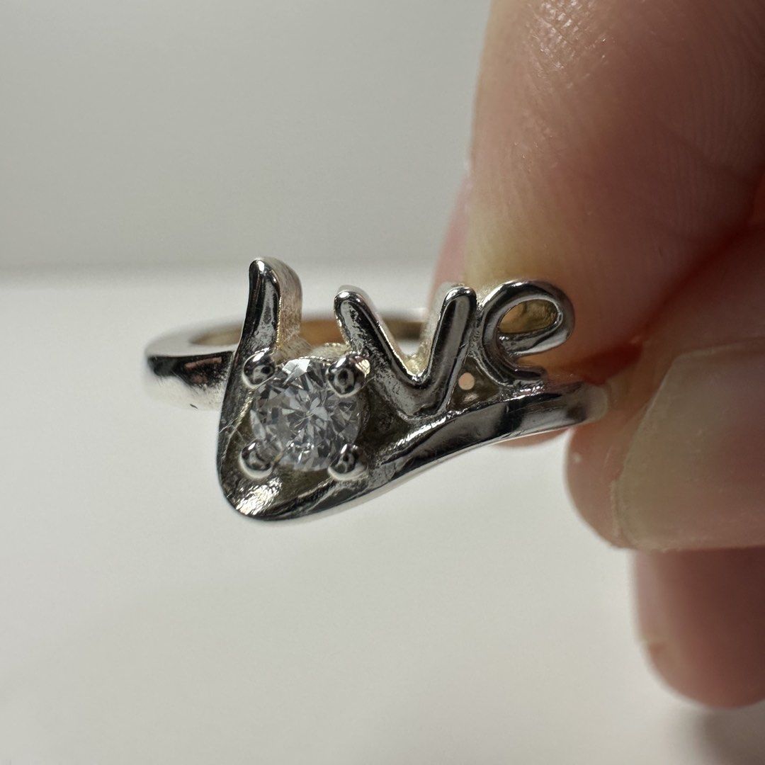 925 silver love ring 2.2g (Category: Rings) located in Pakil. Submitted by primrosehearts (Listing ID 1464525929, Image 1). Description: authentic 925 italy silver with stamping hypoallergenic size: 5.5 grams: 2.2g.