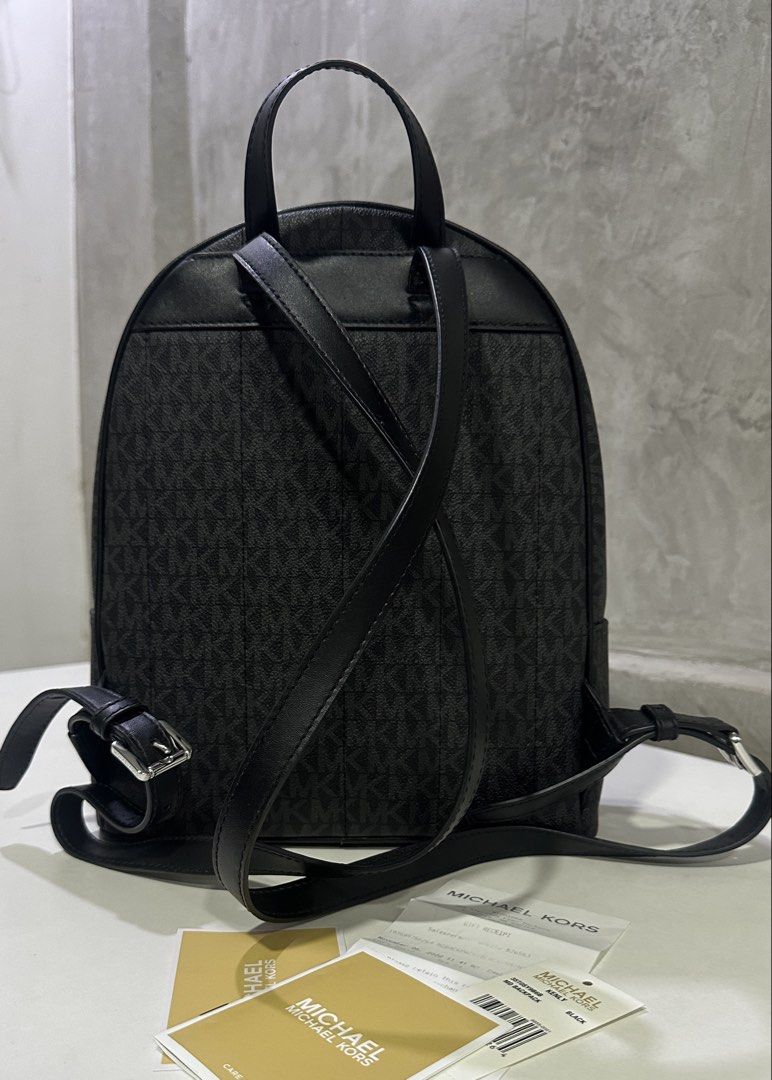 💯 Michael Kors Kenley Medium Logo Backpack (Monoblack) (Category: Backpacks) located in Pasig City. Submitted by heyelena (Listing ID 1464417761, Image 2). Description: Michael Kors Kenley Medium Logo Backpack (Monoblack) ❤️ AUTHENTIC / ORIGINAL 🧡 In very good condition, like new 💛 Used only around 3-4 times 💚 No flaws on straps or zippers 💙 Comes with Michael Kors receipt, care booklet, tag 💜 RFS: Decluttering • Black signature color • PVC