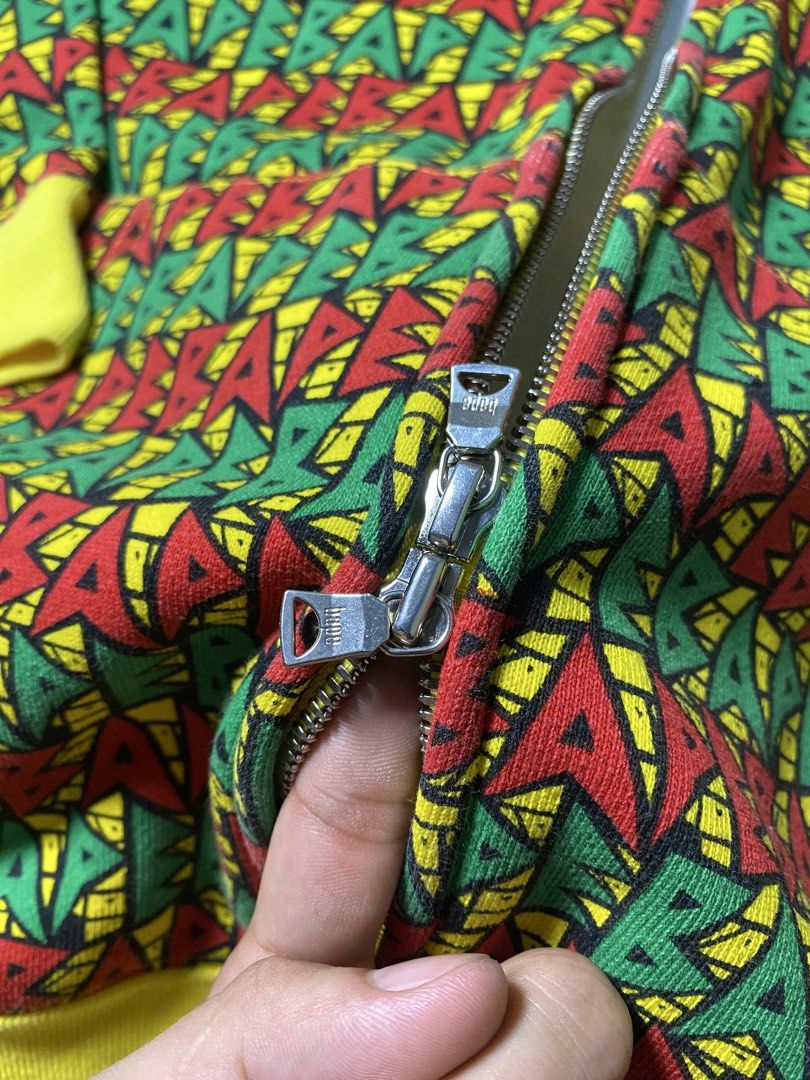 A BATHING APE RASTA FULL ZIP HOODIE (Category: Coats, Jackets and Outerwear) located in Antipolo. Submitted by asiansnot613 (Listing ID 1464481932, Image 3). Description: wts a bathing ape rasta full zip hoodie 23.5x26.5 | used - good authentic. dm for more details. antipolo city, rizal📌.