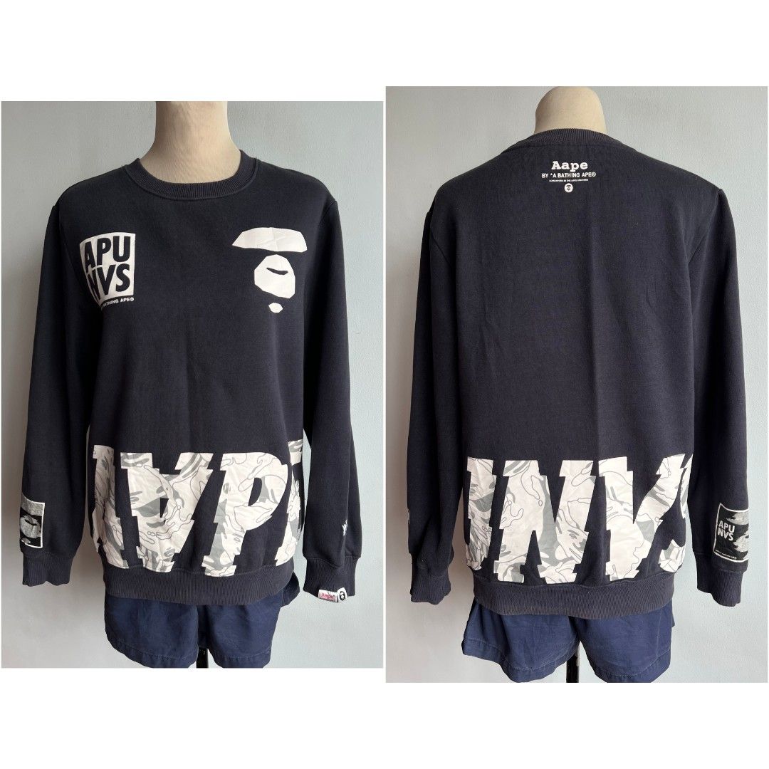 Aape Sweatshirt Jacket sweater men's (Category: Coats, Jackets and Outerwear) located in Quezon City. Submitted by rosepam (Listing ID 1464379808, Image 2). Description: Aape by A Bathing Ape APUNVS Camo Block Panel Crewneck Sweatshirt Size on tag: M (170/88a) *some dirt/stain sa print (pic 7) FIX PRICE Measurements posted for reference Wash before wearing (stored item).