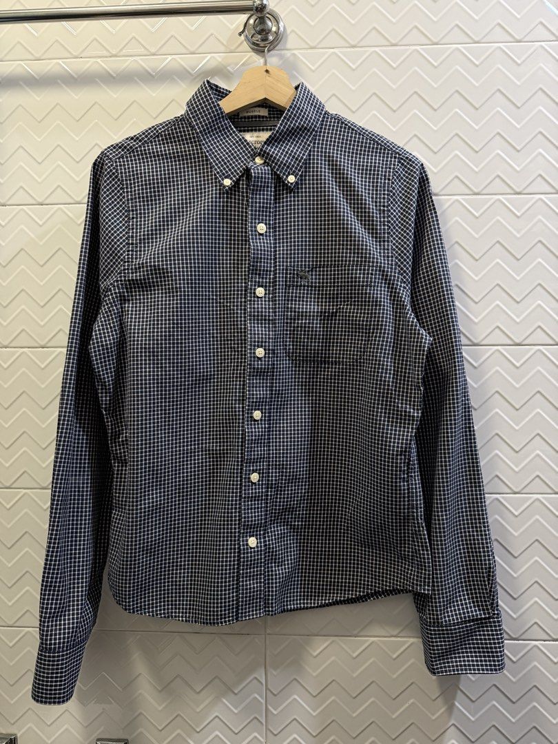 Abercrombie & Fitch Button Down Shirt Size S (Category: Tshirts & Polo Shirts ) located in Quezon City. Submitted by soloqueenph (Listing ID 1464411578, Image 2). Description: - Brand: Abercrombie & Fitch - Color: Navy blue and white checkered - Size: Tagged S - Features: Small embroidered moose logo on chest pocket, button collar, long sleeves with button cuffs - Condition: Great for casual or smart-casual wear .