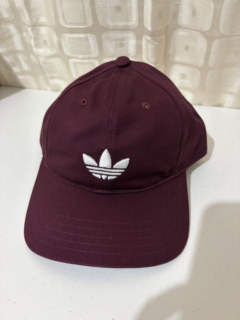 Adidas Baseball Cap Maroon Original (Category: Caps & Hats) located in Lucena. Submitted by minimal_decluttering (Listing ID 1464511415, Image 1). Description: Onhand Brandnew .