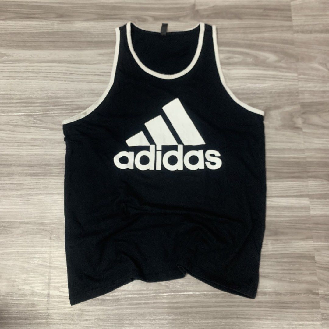 Adidas biglogo tanktop (Category: Activewear) located in Cavite. Submitted by yobubsss (Listing ID 1464553409, Image 1). Description: Size large 21w 29L Good condition Issue need wash cut washtag.