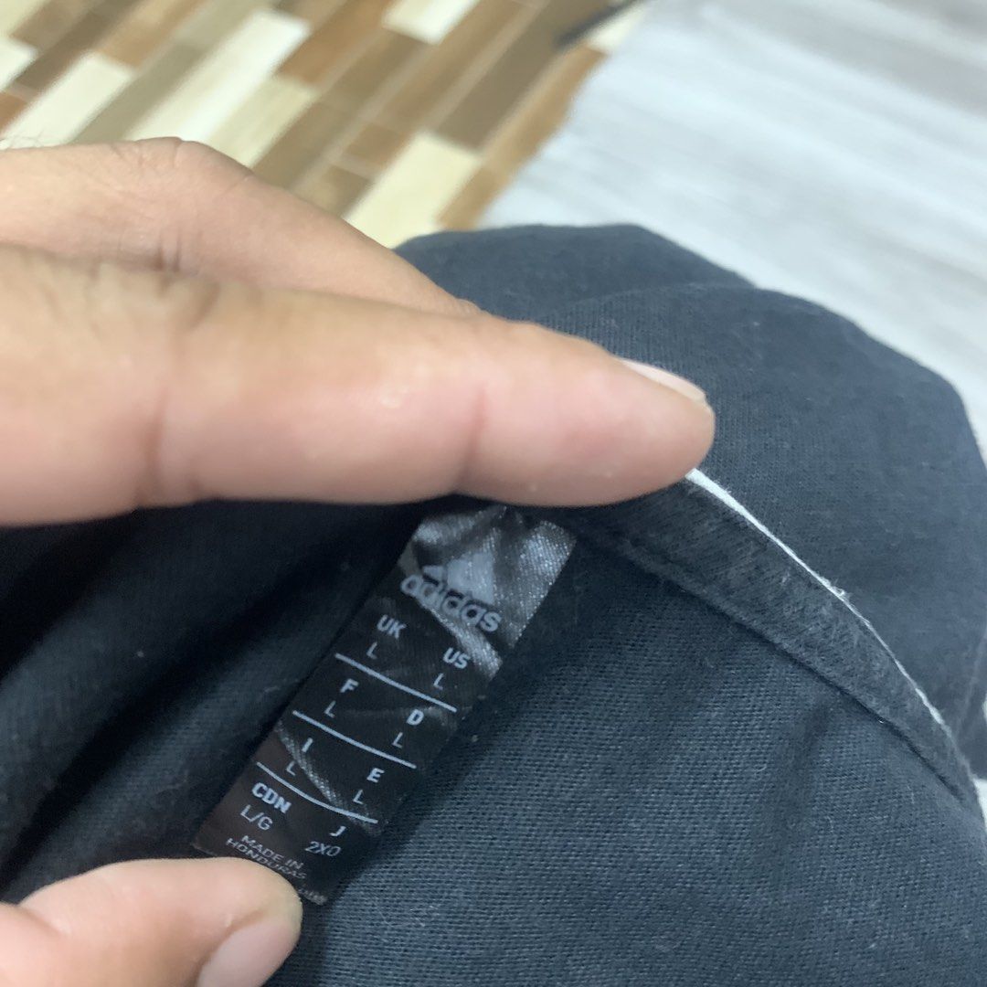Adidas biglogo tanktop (Category: Activewear) located in Cavite. Submitted by yobubsss (Listing ID 1464553409, Image 3). Description: Size large 21w 29L Good condition Issue need wash cut washtag.