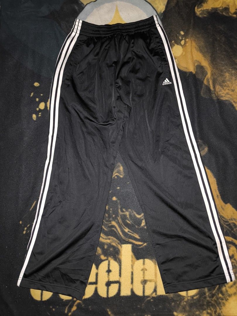 Adidas Black Snap Button Track Pants (Category: Joggers) located in Manila. Submitted by fljaoti27 (Listing ID 1464361527, Image 3). Description: Adidas Track pants Button Medium.