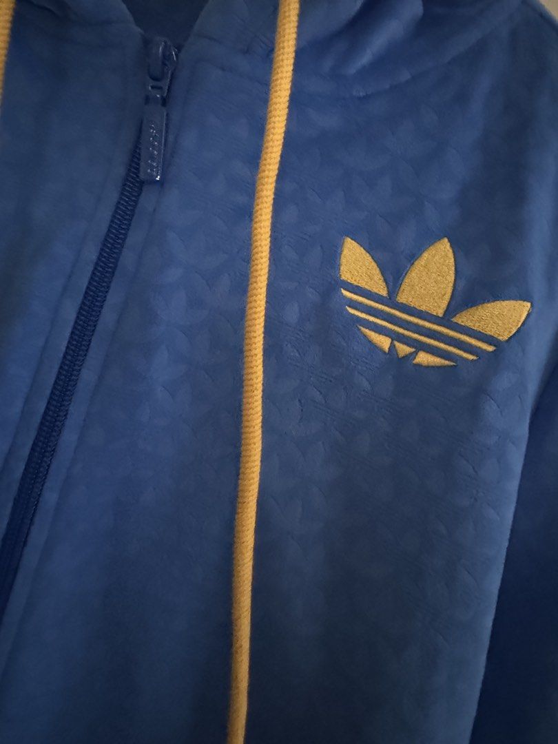 Adidas Blue Velour Monogram Hoodie (Category: Coats, Jackets and Outerwear) located in Muntinlupa City. Submitted by fufuwee (Listing ID 1464432684, Image 2). Description: Adidas Velour hoodie Yellow zip Monogram Pattern Velour material. Selling. Its a gift and not my style..