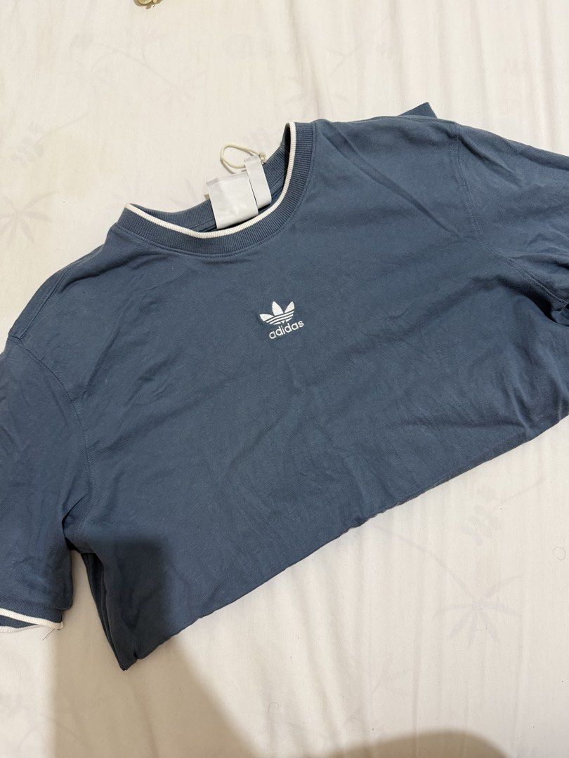 Adidas Shirt (Category: Tshirts & Polo Shirts ) located in Quezon City. Submitted by steffo_declutters (Listing ID 1464400074, Image 1). Description: .