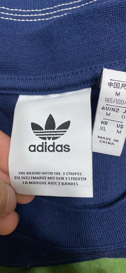 Adidas T-Shirt Navy Blue Size M (Category: Shirts) located in Manila. Submitted by cyyruss (Listing ID 1464374550, Image 3). Description: - Classic navy blue Adidas t-shirt -ORIGINAL FROM UAE - Features a subtle, small Adidas logo on the chest - Stylish contrast stitching along the seams - Made from comfortable, breathable cotton material - Ideal for casual everyday wear.