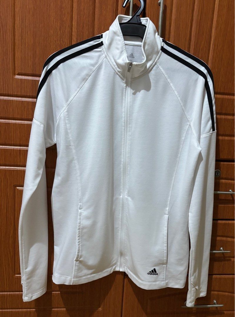 Adidas White Golf Jacket Medium (Category: Coats, Jackets and Outerwear) located in Quezon City. Submitted by beckyshop2024 (Listing ID 1464567204, Image 1). Description: - Used once - In mint condition - Original from US - Fits up to Semi-Large - Width: 19.5"; Length: 26.5".