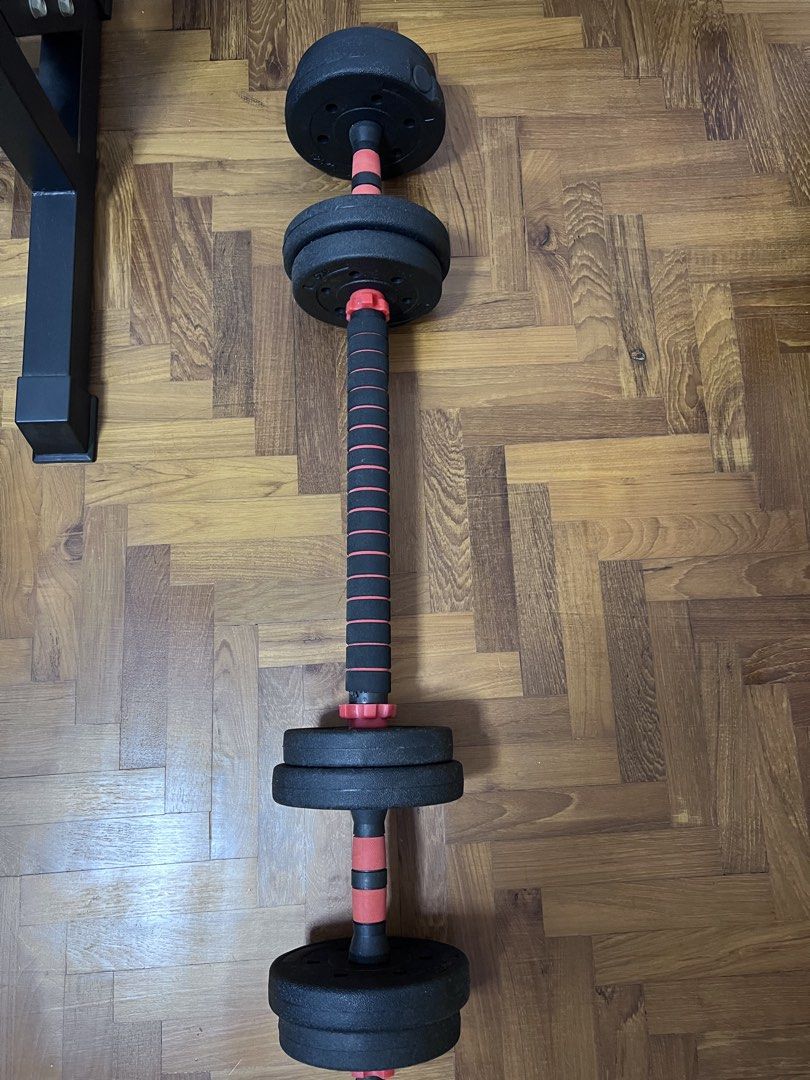 Adjustable weights (Category: Weights & Dumbbells) located in Singapore. Submitted by stanmoong (Listing ID 1464414408, Image 2). Description: - 4 x 1kg, 4 x 1.25kg plates - Adjustable dumbbells for versatile strength training. - Secure spin-lock collars for easy weight customization. - Comfortable, non-slip grip handles. - Suitable for home gym use..