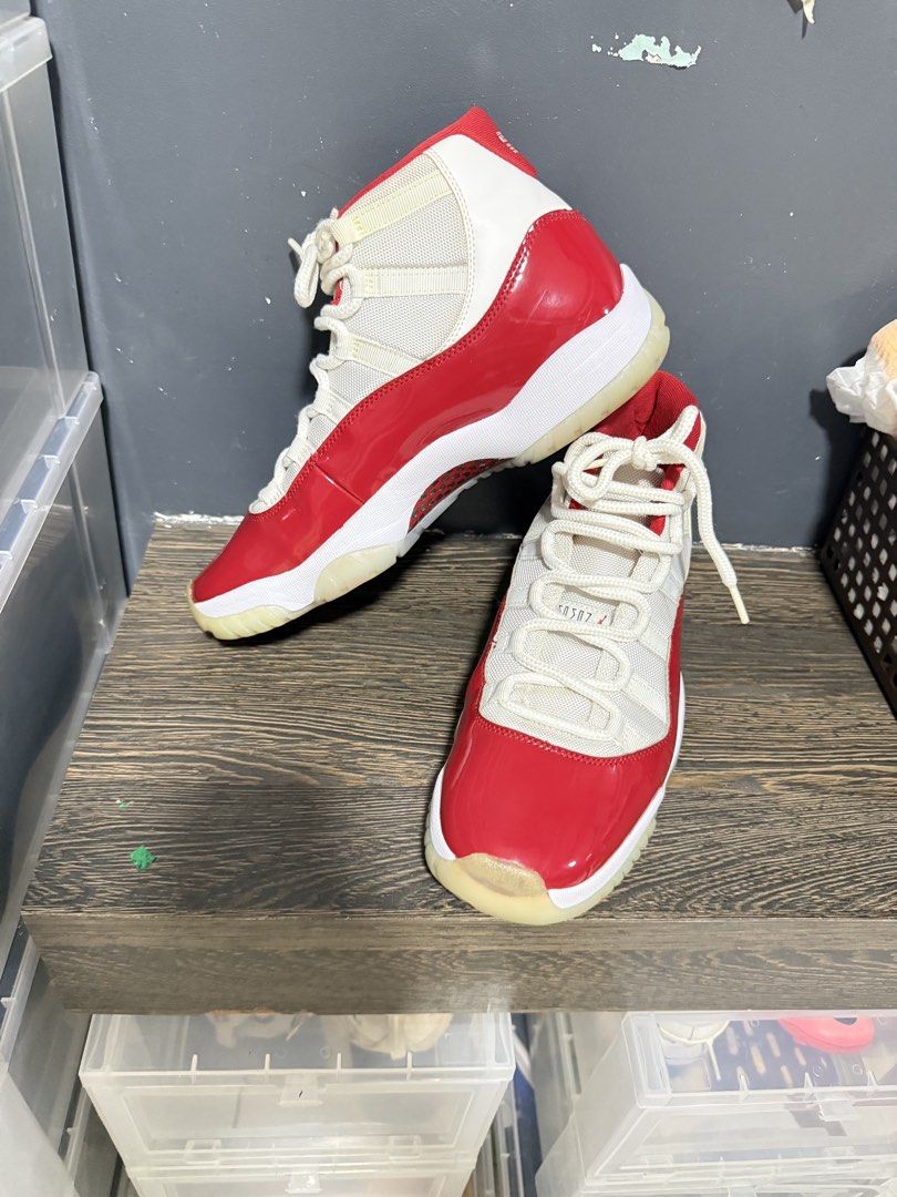 Air Jordan 11 Retro Cherry (Category: Sneakers) located in Quezon City. Submitted by dhessia (Listing ID 1464362913, Image 2). Description: - Classic Air Jordan 11 Lows in Red and White - Iconic patent leather mudguard - Breathable mesh and leather upper - Durable translucent outsole - Essential for Jordan collectors - Great for casual wear or basketball Orig and local release - 2022 Pair only/no box Seldom used na, pa linis nyo na lang .