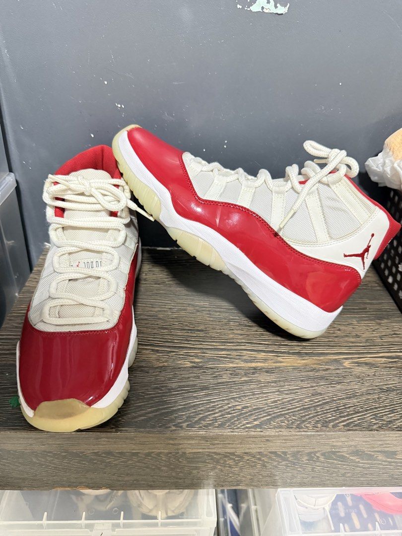 Air Jordan 11 Retro Cherry (Category: Sneakers) located in Quezon City. Submitted by dhessia (Listing ID 1464362913, Image 3). Description: - Classic Air Jordan 11 Lows in Red and White - Iconic patent leather mudguard - Breathable mesh and leather upper - Durable translucent outsole - Essential for Jordan collectors - Great for casual wear or basketball Orig and local release - 2022 Pair only/no box Seldom used na, pa linis nyo na lang .