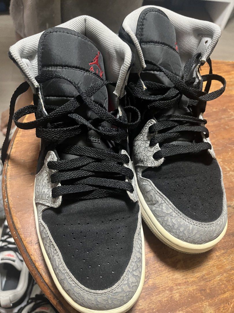 Air Jordan 1 High OG "Elephant Print" (Category: Sneakers) located in Manila. Submitted by tinaoangie31124 (Listing ID 1464569443, Image 2). Description: - Classic high-top Jordans - Colorway: Black, grey, and white - Iconic elephant print on toe box and heel - Secure lace-up closure - Essential addition to any sneaker collection.