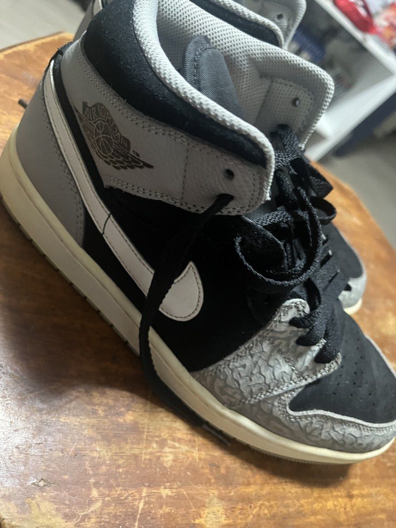Air Jordan 1 High OG "Elephant Print" (Category: Sneakers) located in Manila. Submitted by tinaoangie31124 (Listing ID 1464569443, Image 1). Description: - Classic high-top Jordans - Colorway: Black, grey, and white - Iconic elephant print on toe box and heel - Secure lace-up closure - Essential addition to any sneaker collection.