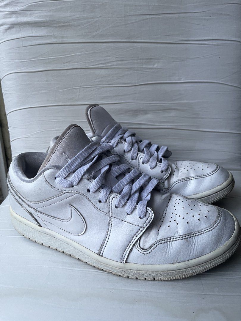 Air Jordan 1 Low Triple White 7M (Category: Sneakers) located in Paranaque City. Submitted by smconsul (Listing ID 1464455188, Image 3). Description: 8.5W/7M - authentic White Air Jordan 1 Lows - Classic low-top design - Still a durable pair for everyday wear - Sold as is, needs cleaning Loc: las Pinas Shipping: J&T, lalamove, grab.