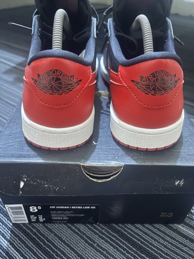 Air Jordan 1 Retro Low OG Chicago (Category: Sneakers) located in Muntinlupa City. Submitted by yellafella03501 (Listing ID 1464414290, Image 2). Description: - Classic Air Jordan 1 Low Chicago colorway - Features black, red, and white accents - Size: 8.5 US Men's - Includes original box - A must-have for any sneaker collection.