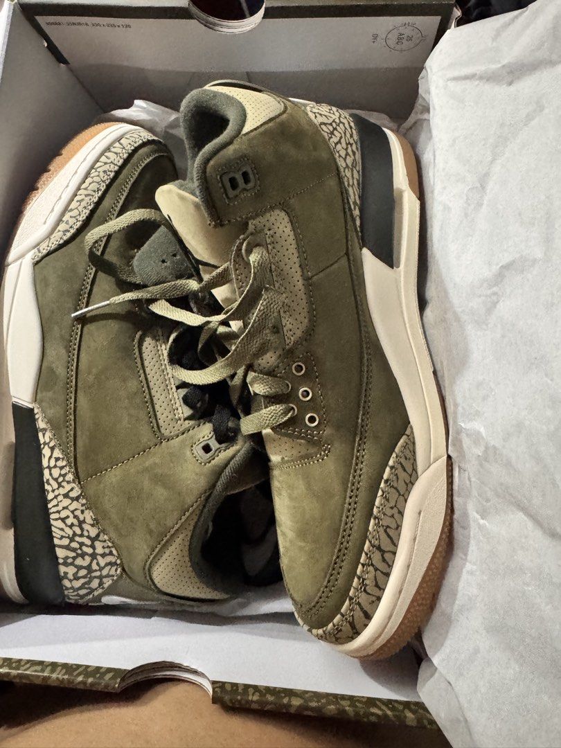 Air Jordan 3 Retro Olive DN3707-202 (Category: Sneakers) located in Manila. Submitted by ohmypoldo (Listing ID 1464375795, Image 2). Description: - Air Jordan 3 Retro in Olive colorway - Size: US Men's 9 - Comes with original box - Ideal for collectors and everyday wear - Features a unique camouflage-like pattern on the box.