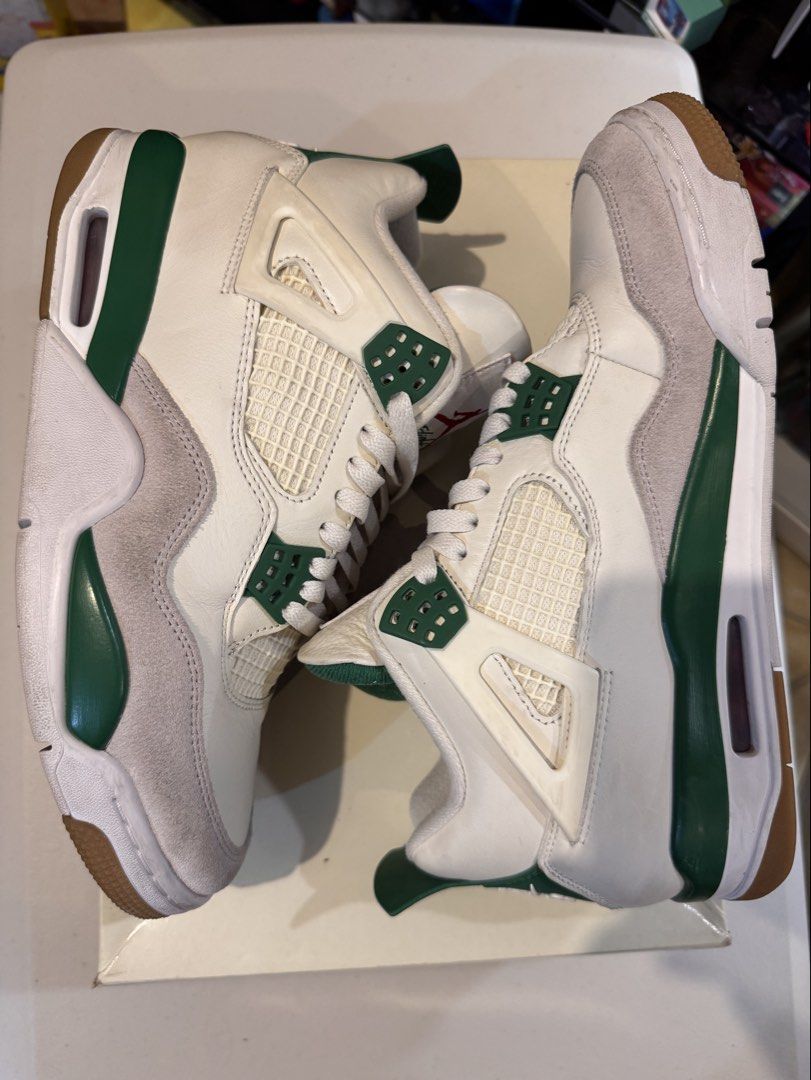 Air Jordan 4 SB Pine Green (Category: Sneakers) located in Manila. Submitted by conneryboy (Listing ID 1464550552, Image 2). Description: - Size: US 9.5 - What you see is what you get, no hidden issues like sole separation. - Well-maintained, regularly treated with Crep Protect, and stored in an air-conditioned room. Worn primarily for office and never used on public transport. - Box has a tear from being packed in luggage during travel from the 