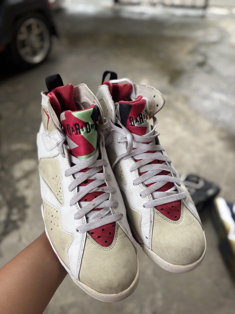 Air Jordan 7 Retro "Hare" White Red (Category: Sneakers) located in Marikina City. Submitted by kuyamosafe (Listing ID 1464400085, Image 2). Description: - Authentic Air Jordan 7 Retro 'Hare' sneakers - Classic white and red colorway - Features iconic 'Hare' print on tongue - Jumpman logo and '23' on heel - Soles have some wear but good tread remaining - Ideal for sneaker collectors or casual wear.