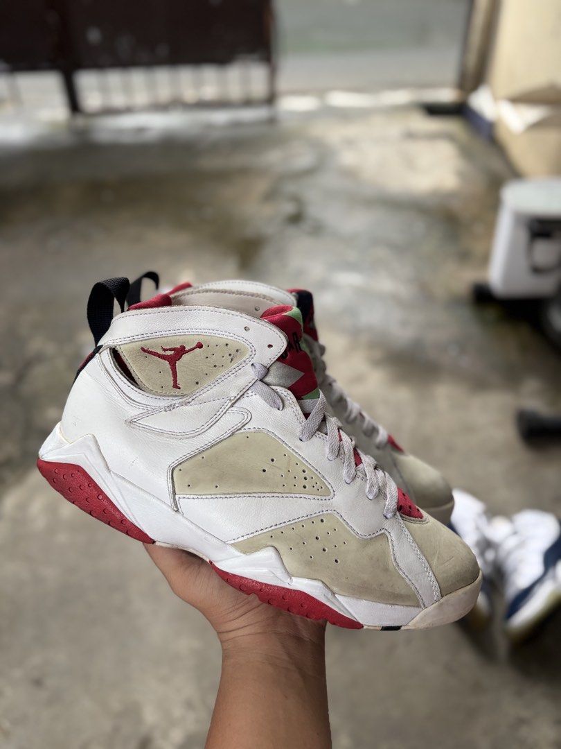 Air Jordan 7 Retro "Hare" White Red (Category: Sneakers) located in Marikina City. Submitted by kuyamosafe (Listing ID 1464400085, Image 1). Description: - Authentic Air Jordan 7 Retro 'Hare' sneakers - Classic white and red colorway - Features iconic 'Hare' print on tongue - Jumpman logo and '23' on heel - Soles have some wear but good tread remaining - Ideal for sneaker collectors or casual wear.