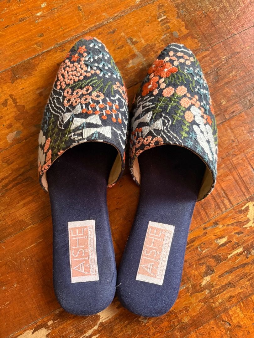 Aishe embroidered mules size 8 (Category: Flats & Sandals) located in Quezon City. Submitted by mariane_1963 (Listing ID 1464372811, Image 1). Description: - Embroidered mules from Aishe - Pointed toe, slip-on style - Easy to wear and super nice! - Size 8 - Bought at Artefino 2026 for 3k (2.5k if you buy from Aishe directly, see last picture) - Never used; no more box but I still have the paper bag - No more haggling please as I am selling lower 