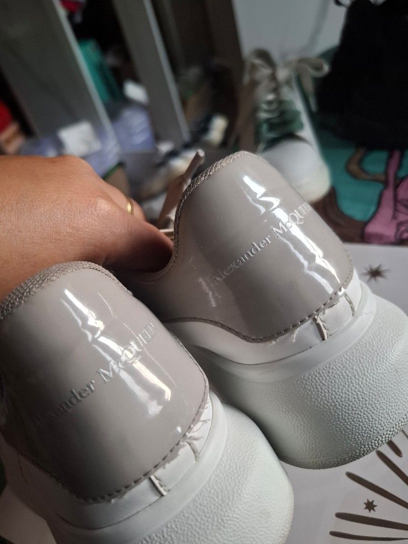 Alexander McQueen Oversized Sneakers White (Category: Sneakers) located in Marikina City. Submitted by bags21.ph (Listing ID 1464439834, Image 2). Description: - Authentic Alexander McQueen white leather sneakers - Features grey laces - Signature Alexander McQueen logo on heel and insole - Trendy chunky sole design - Ideal for everyday casual wear - Selling as they are no longer needed.
